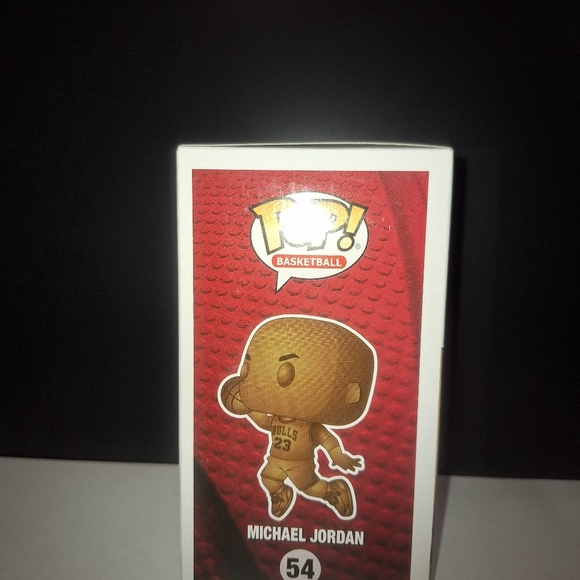 Funko Pop! basketball figure features the legendary Michael Jordan in a bronze - Picture 6 of 6
